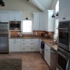 White Thermofoil with Granite Countertops - Built for Mancuso Development