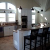 White Thermofoil with Granite Countertops - Built for Mancuso Development