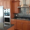 Glazed Cherry Thermofoil with Granite Countertops - Built for Mancuso Development